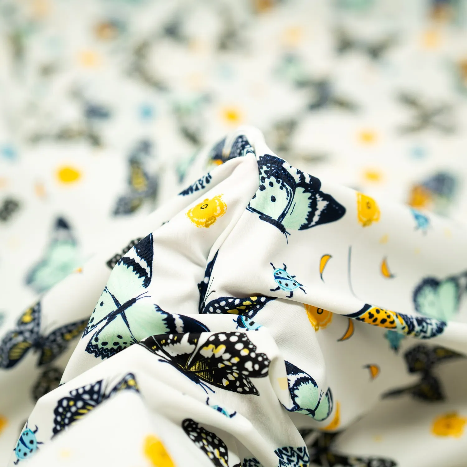 Butterflies and Ladybugs Printed Spandex Fabric | Blue Moon Fabrics