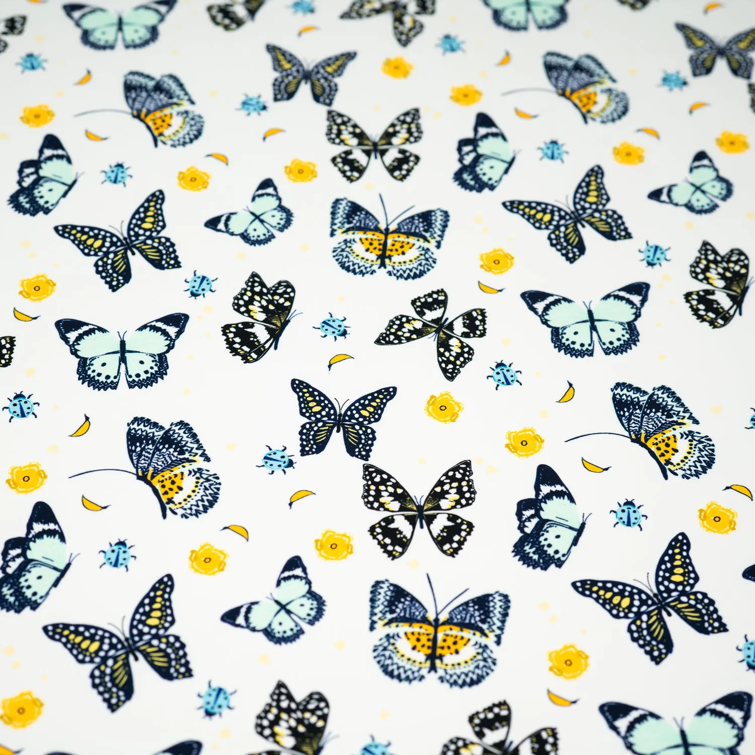 Butterflies and Ladybugs Printed Spandex Fabric | Blue Moon Fabrics