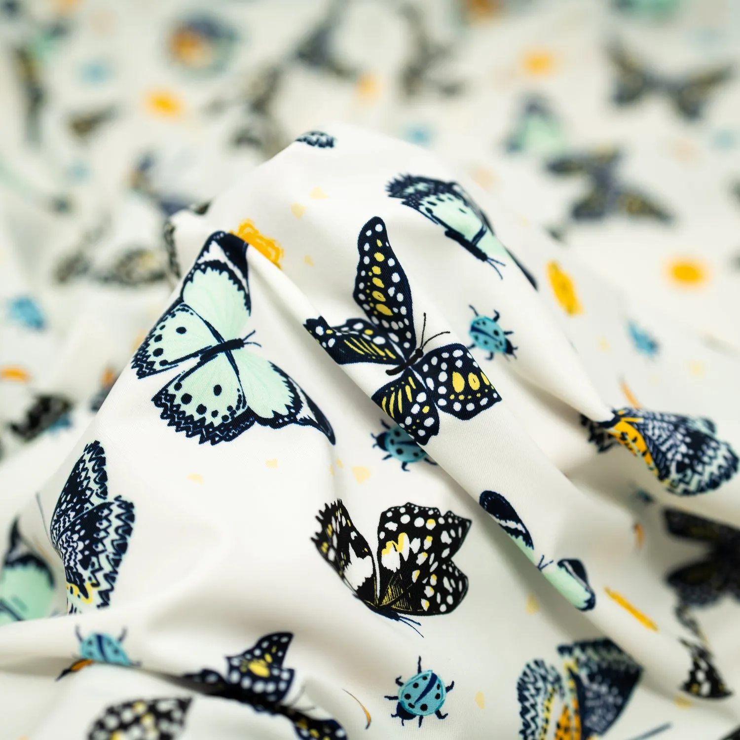 Butterflies and Ladybugs Printed Spandex Fabric | Blue Moon Fabrics