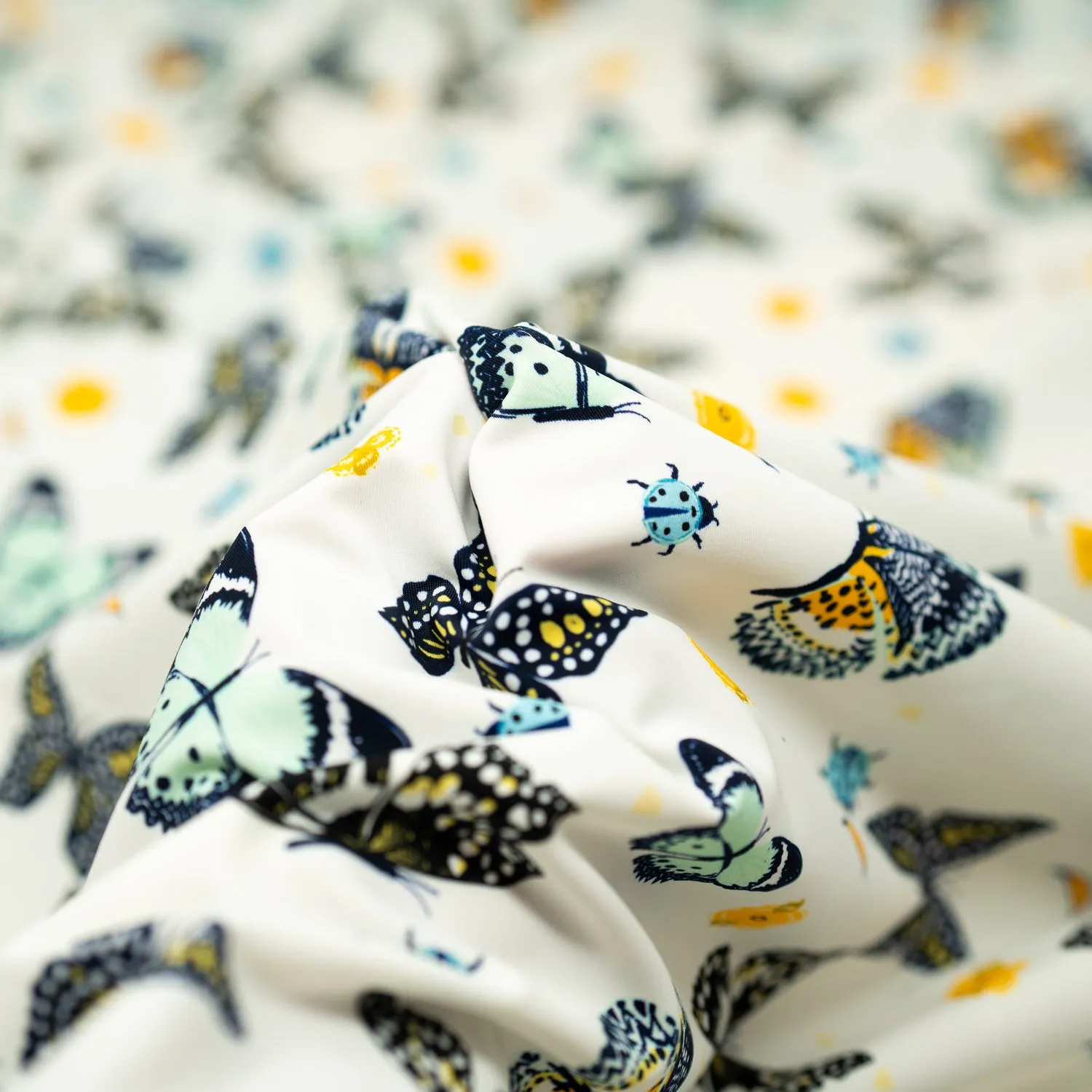 Butterflies and Ladybugs Printed Spandex Fabric | Blue Moon Fabrics