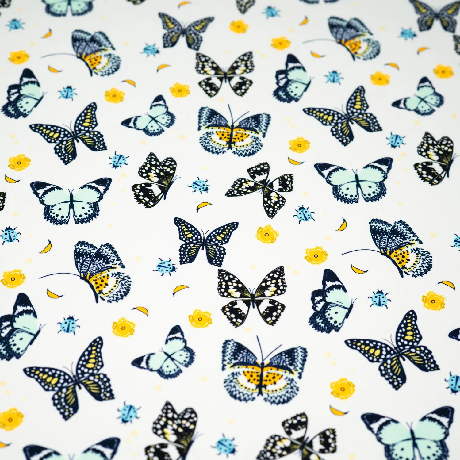 Butterflies and Ladybugs Printed Spandex Fabric | Blue Moon Fabrics