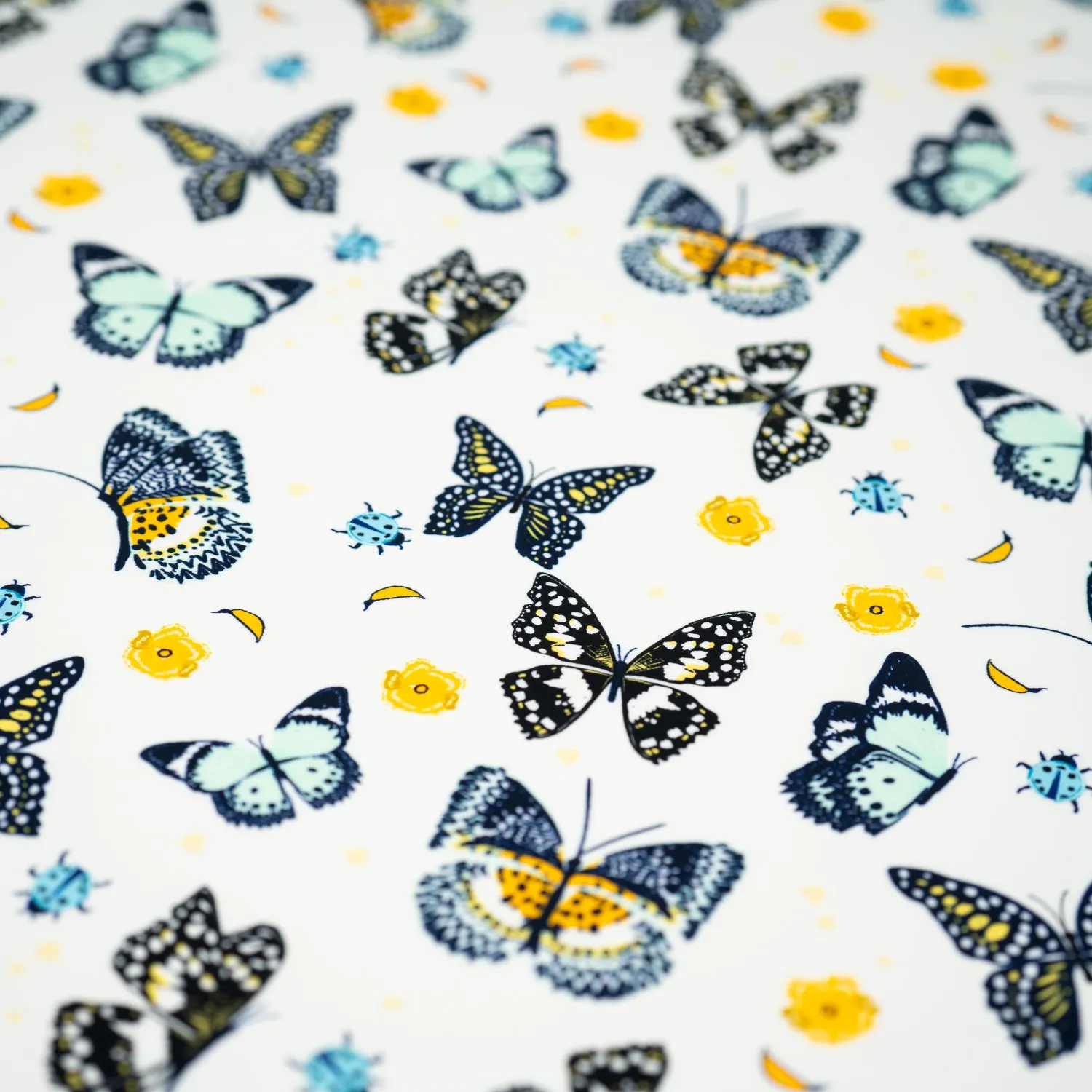 Butterflies and Ladybugs Printed Spandex Fabric | Blue Moon Fabrics