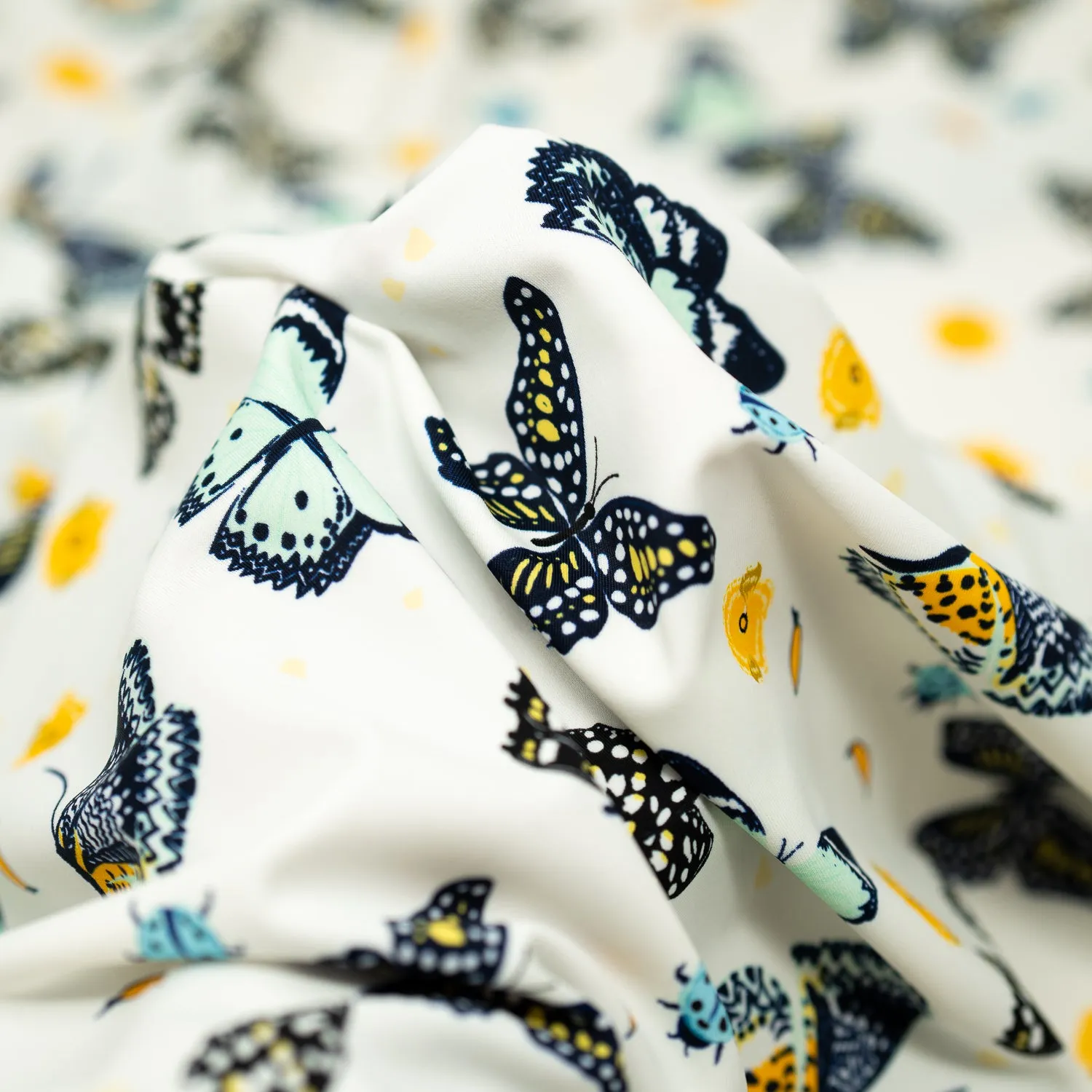 Butterflies and Ladybugs Printed Spandex Fabric | Blue Moon Fabrics