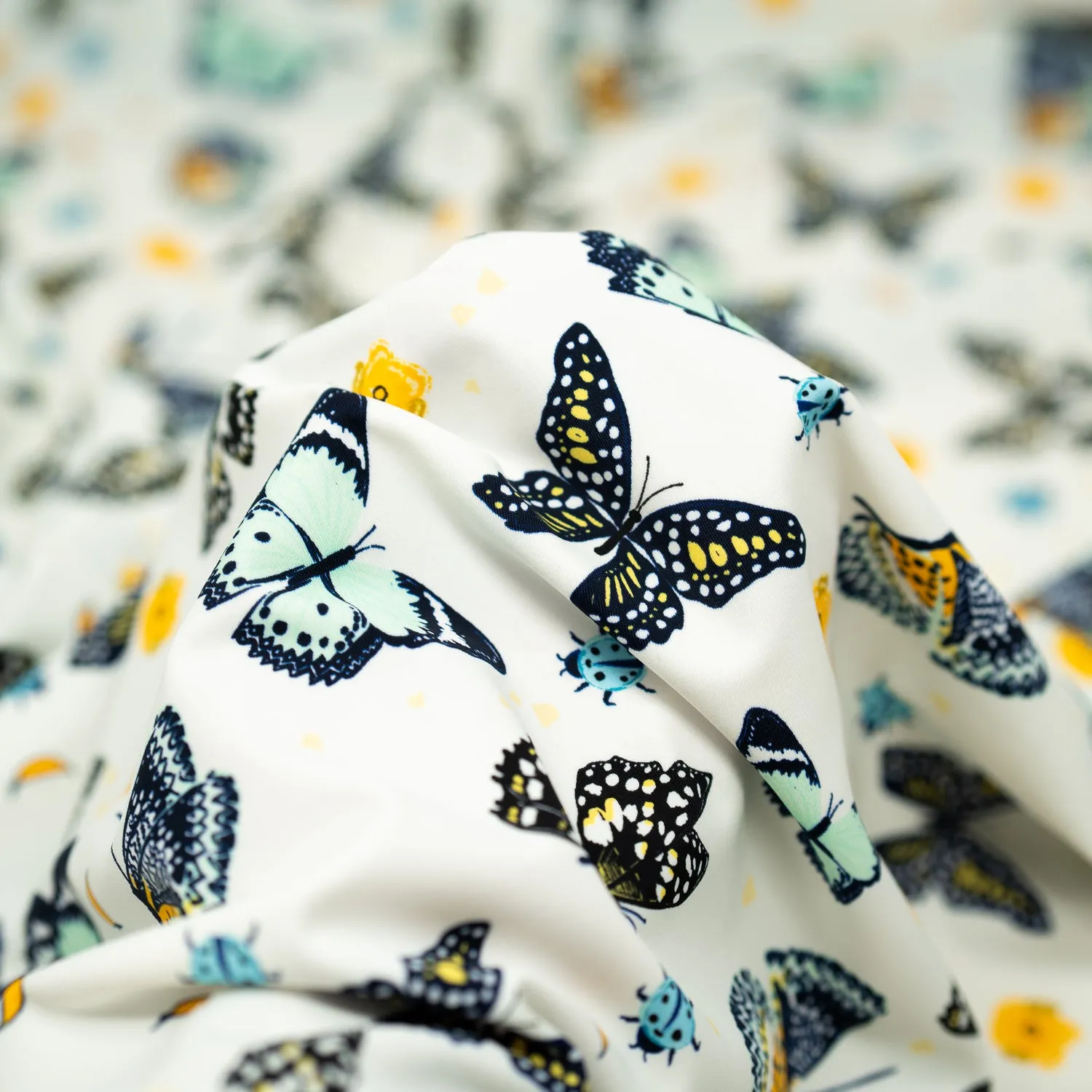 Butterflies and Ladybugs Printed Spandex Fabric | Blue Moon Fabrics