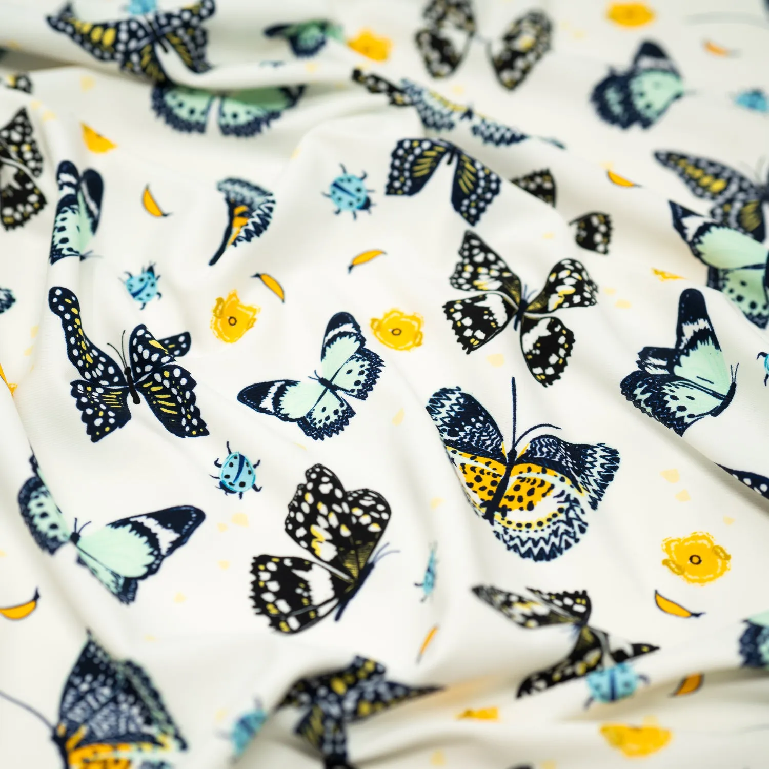 Butterflies and Ladybugs Printed Spandex Fabric | Blue Moon Fabrics